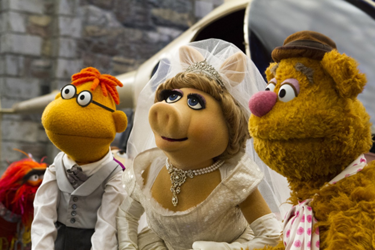 Scooter, Miss Piggy and Fozzie Bear.