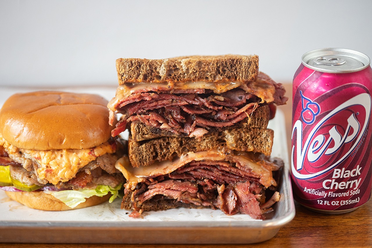 Best Sandwich
Pastrami at Nomad
Even as a young line cook coming up in some of the area’s top restaurants, Tommy Andrew wanted to open a sandwich spot — the sort of place that had that one special thing everyone knew about and came to eat. When he was offered the opportunity to open Nomad (1221 Tamm Avenue, 314-696-2360) in February of 2020, it was a no-brainer that pastrami would be that dish for Andrew. A self-described lover of the peppery cured meat, Andrew had been perfecting his recipe for years and had gotten it so locked down he felt confident he could build an entire restaurant around it. One bite of his pastrami sandwich, and you can taste why he was so bullish. Brined in toasted herbs, sugar, spices, salt, honey and a number of other secret ingredients, the brisket is then rubbed with mustard and black pepper before it’s smoked, giving it layers of flavor beyond the one-dimensional peppery heat that is typical of the deli staple. Even with all these ingredients involved, the dominant tastes you get from Andrew’s pastrami are smoke and beef. And that texture — crumbly like a gorgeous Texas-style brisket and so marbled it slicks the tongue with fat. Andrew piles this glorious meat on marble rye bread with melted Swiss cheese and a Russian dressing–esque tangy special sauce. It’s perfection. —Cheryl Baehr