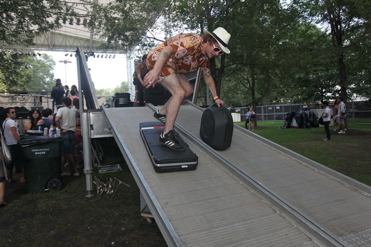 John McCauley of Deer Ticker on Saturday power-slides down the stage ramp on his guitar case.