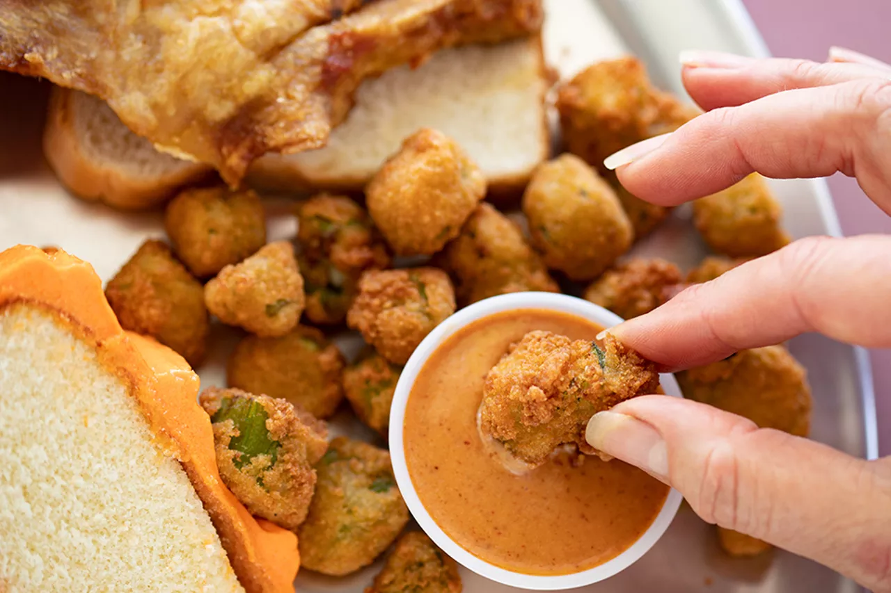 Southern fried okra, pictured here alongside pig snoot and sherbet cake.