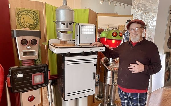 Bill Christman and some of his robot children who live at his new space in the Loop.