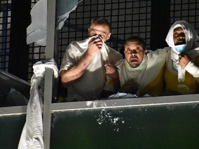Inmates appear to react to a chemical irritant at the St. Louis City Justice Center during an uprising in April 2021.