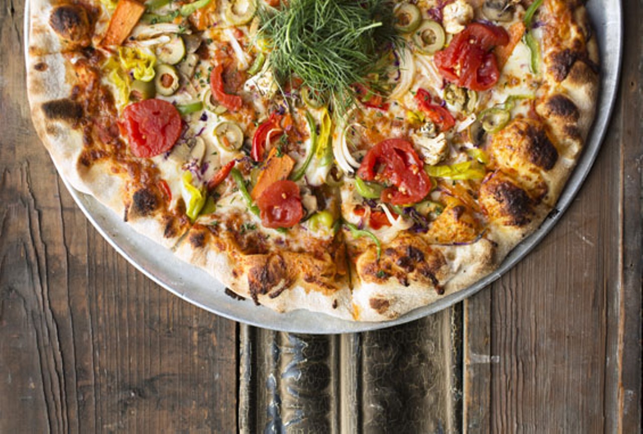 The "Garden of Eatin'" pizza comes topped with house marinara, mozzarella, olives, sliced San Marzano tomatoes, mushrooms, onions, giardinera, peperoncini and fennel.