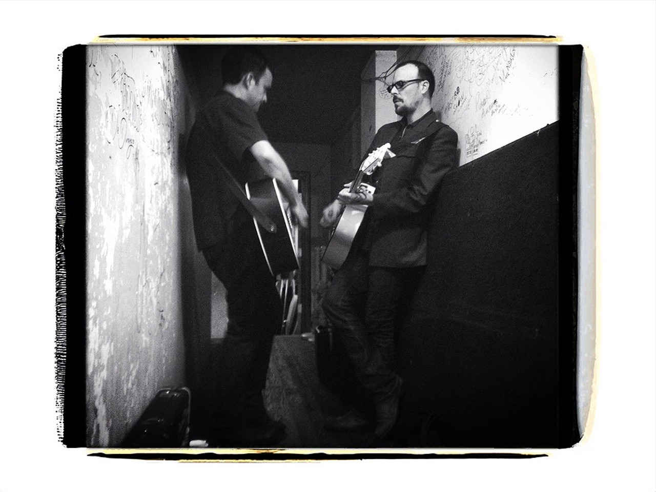 Chris Grabau and Jason Hutto warm up in the hallway behind the stage