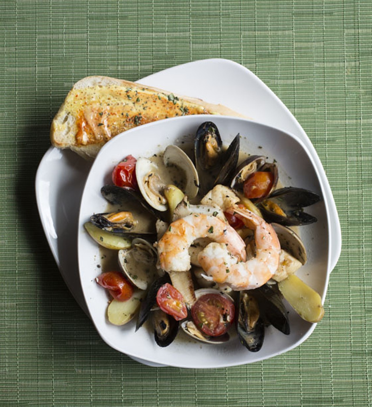 Bouillabaisse comes stocked with shrimp, halibut, mussels and clams.