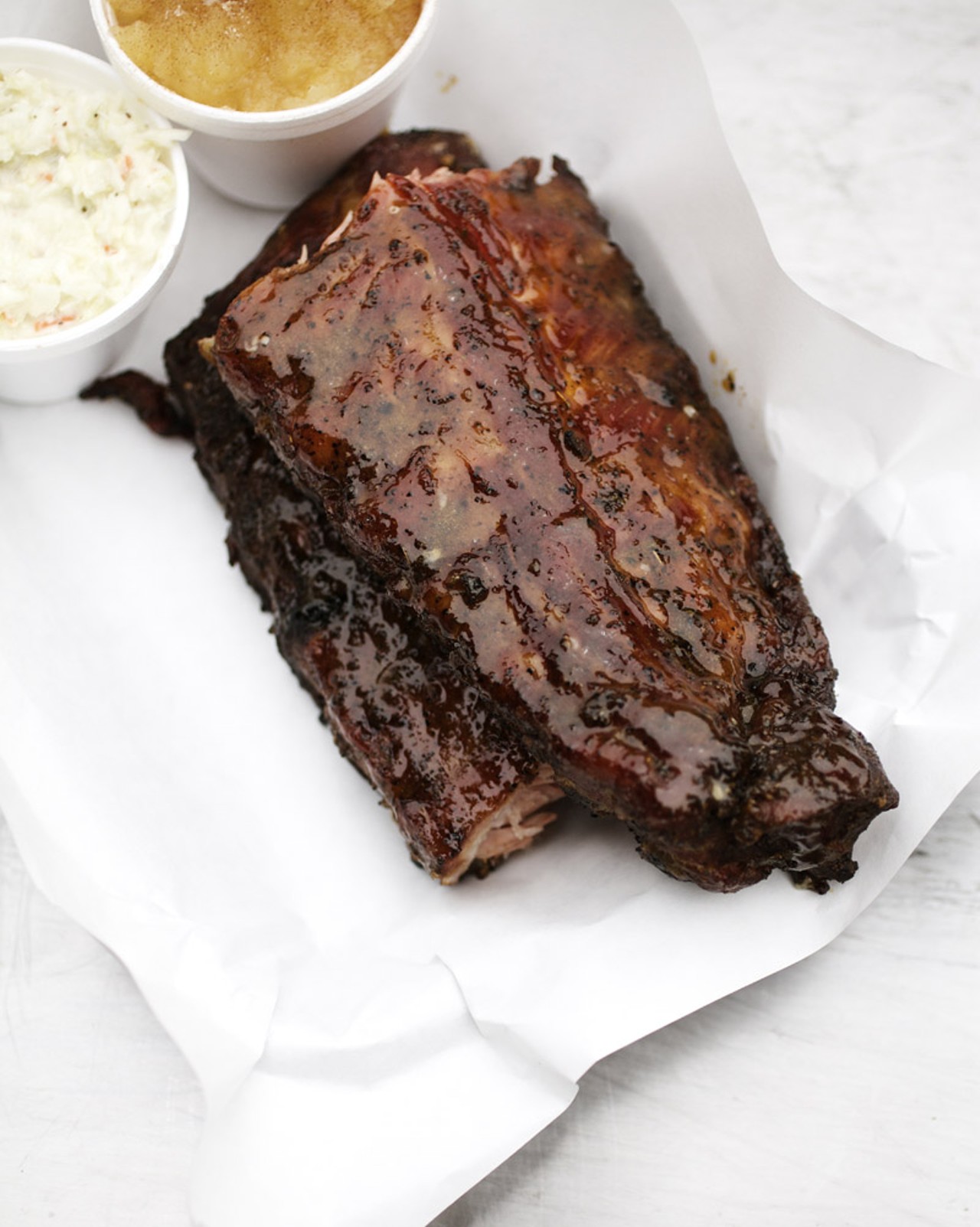 A Full Slab of Ribs with applesauce and slaw.