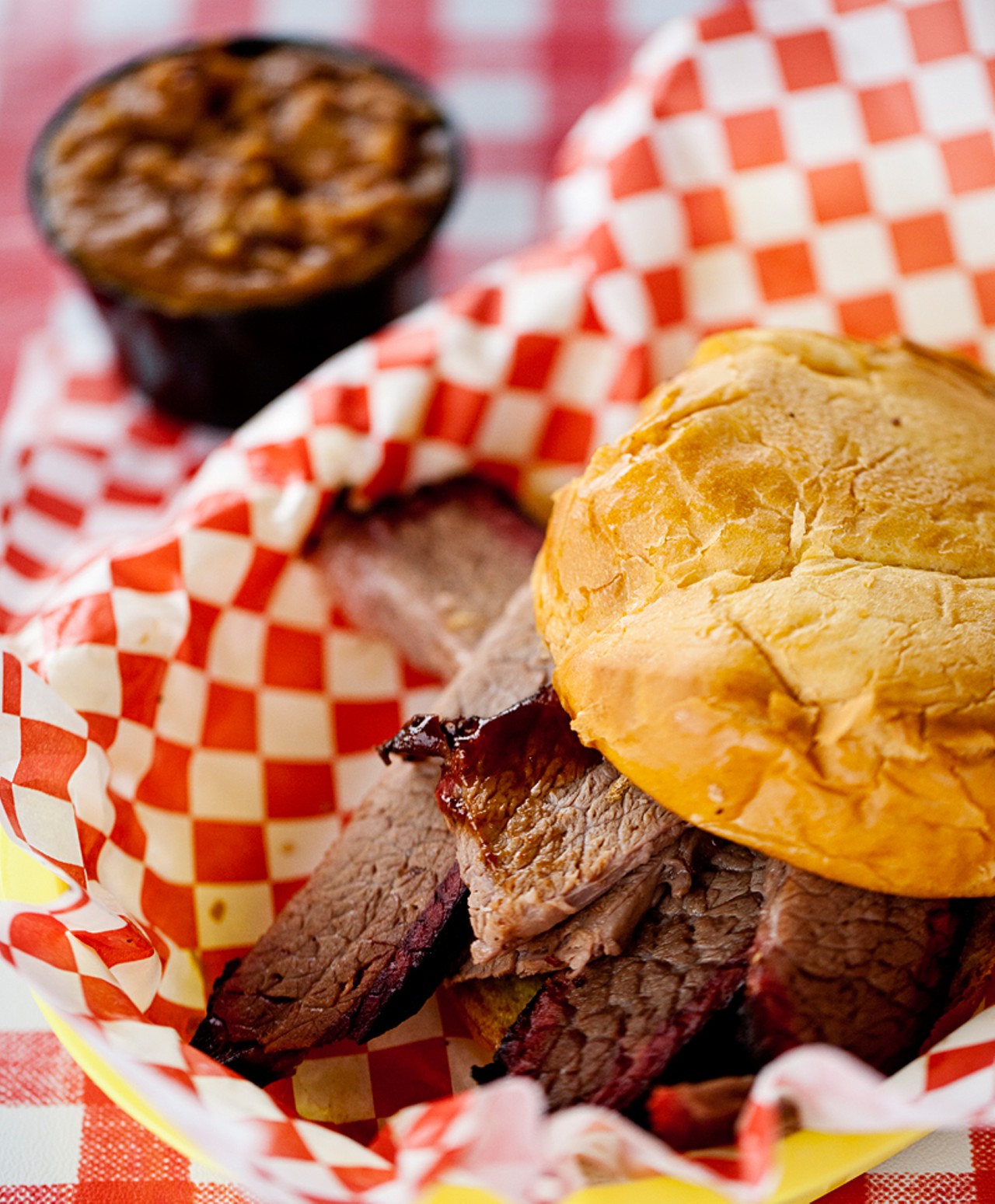 The brisket sandwich with BBQ beans.
