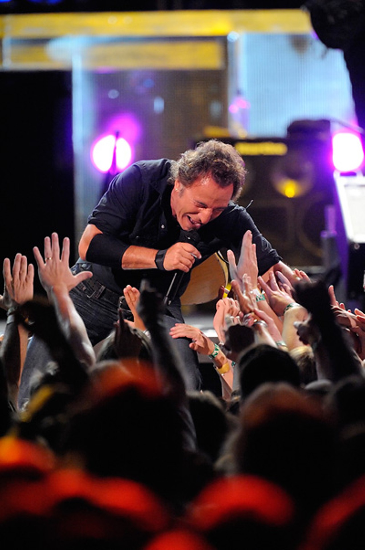 The Boss worked the length of the stage during the third song of the night, "Out In The Street," making stops at the front of the stage and at either end.Read a review of show.