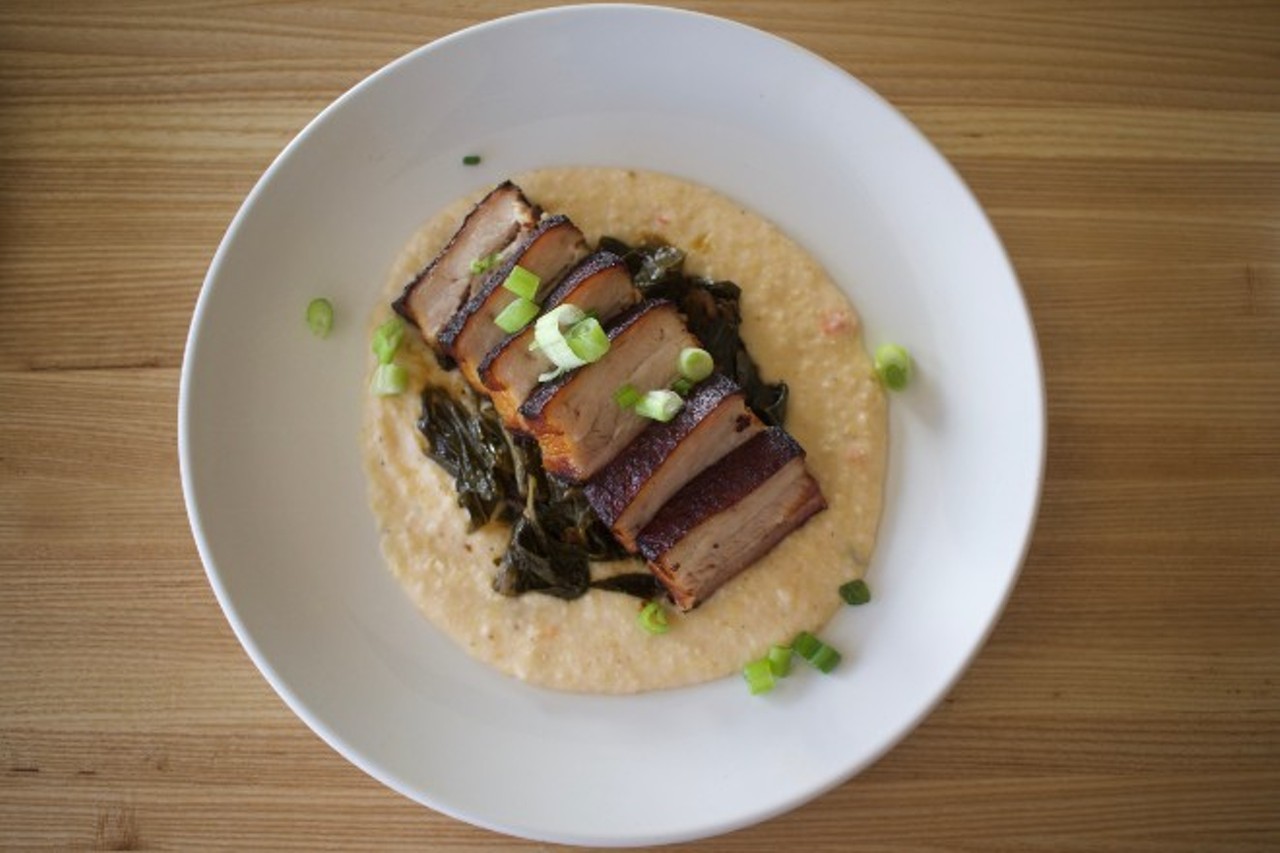 Beast Butcher and Block 
( 4156 Manchester Avenue, 314-944-6003)
Pictured: Crispy pork belly served over grits with collard greens.