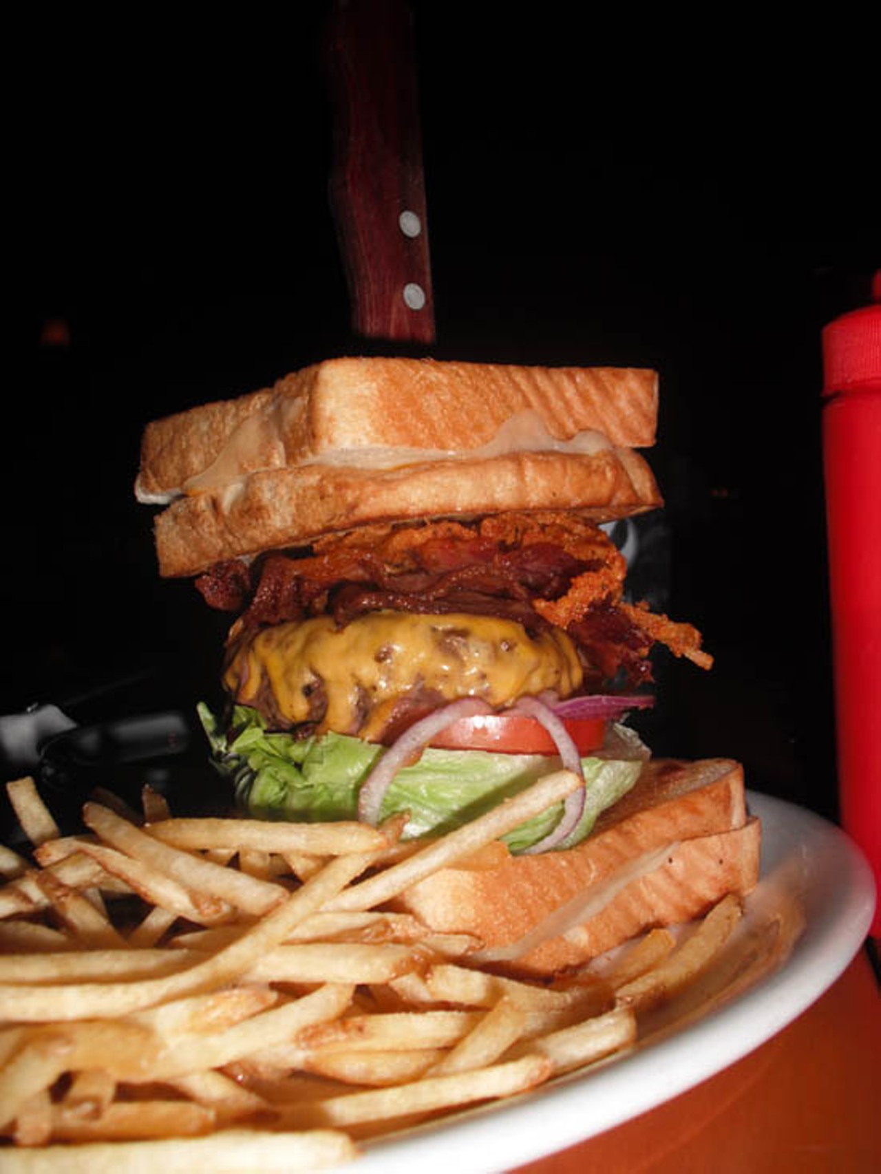 Source: Phoenix
Where: The Lodge
What's better than a burger? Try a burger sandwiched between two grilled cheese...sandwiches! The Lodge in Scottsdale, Arizona has such a burger and they called it The Sasquatch. Eat this burger and you won't get a free T-shirt or your picture on some sort of wall of fame. No, you'll get the satisfaction that you are a man; a man who is very, very full. 
Read more on Phoenix New Times: Big Ass Burger Battle.