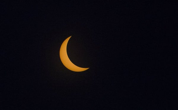 No, that's not the moon. That's the sun during a solar eclipse as viewed from South City.
