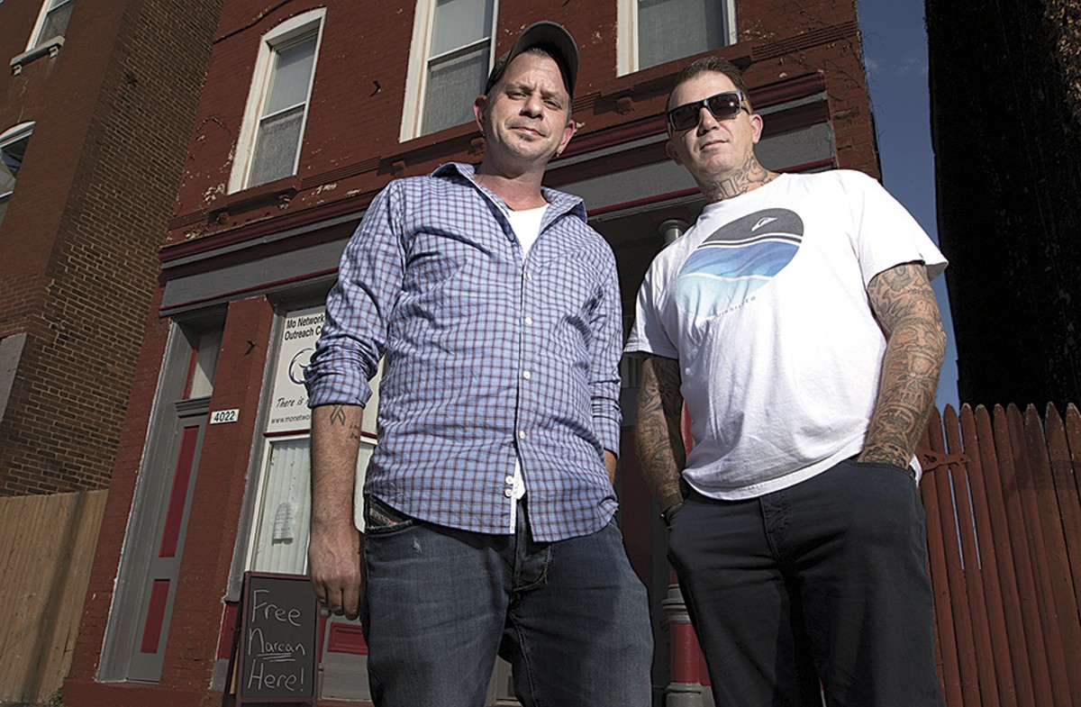 Chad Sabora and Robert Riley II, co-founders of the Missouri Network for Opiate Reform and Recovery, stand outside their outreach center on Broadway.