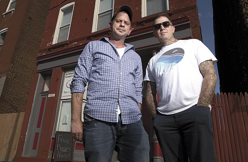 Chad Sabora and Robert Riley II, co-founders of the Missouri Network for Opiate Reform and Recovery, stand outside their outreach center on Broadway.