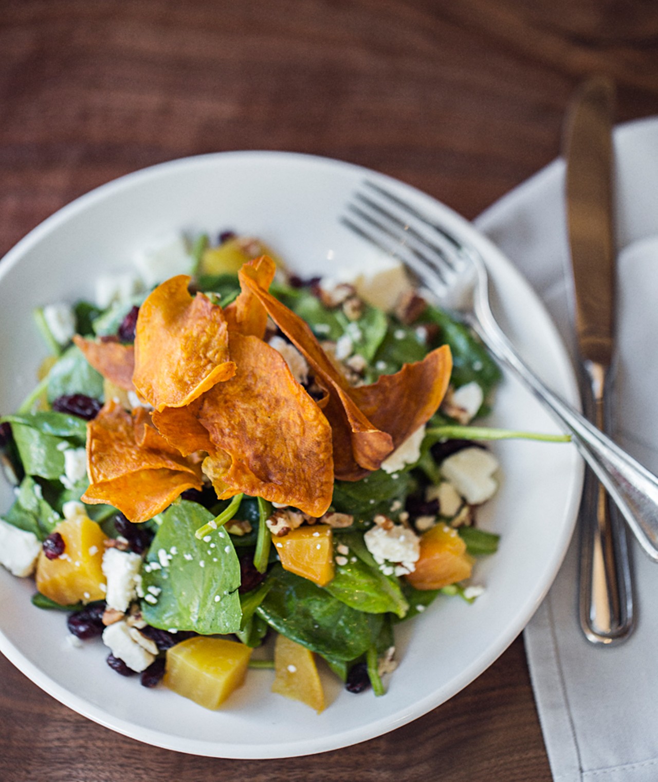 White Box's "Fall Salad" consists of baby spinach, roasted beets, pears, toasted pecans, dried cranberries, crumbled feta, sweet potato chips and a maple vinaigrette.