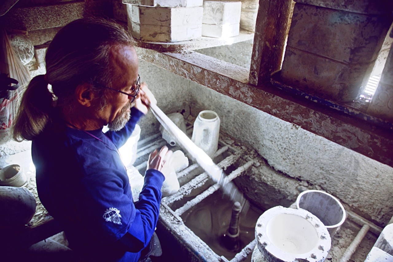 Kent prepares the Mana Pottery mold.