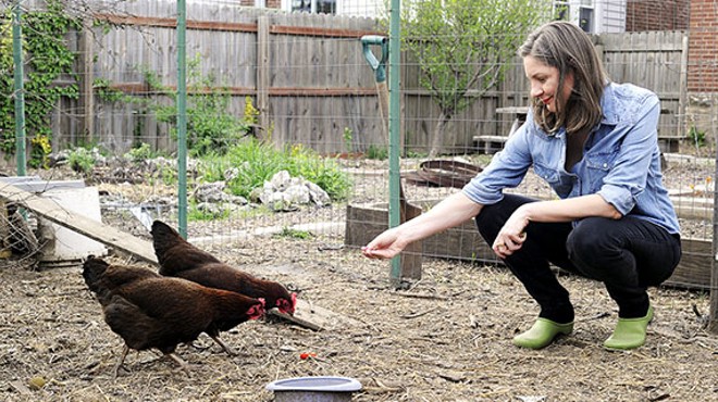 The writer's partner, Amy Van Donsel, with some of their fowl friends.