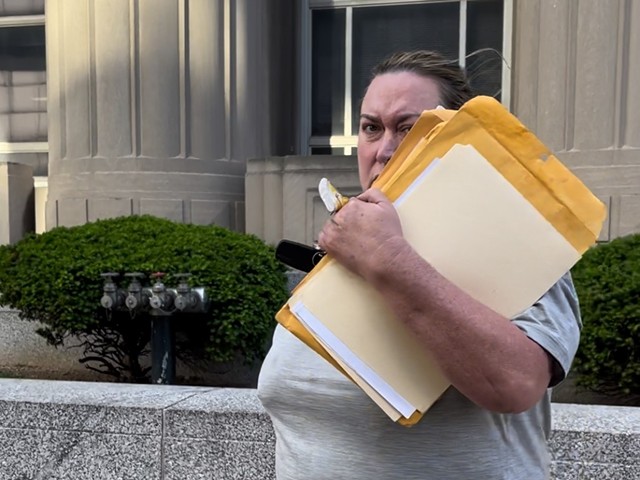 Dara Daugherty leaving court after giving testimony April 30.