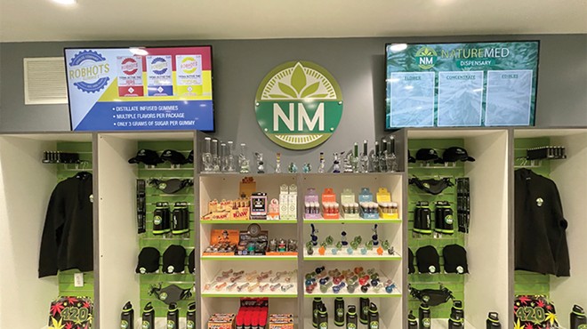 The head shop vibe of Nature Med Dispensary is strong, with cases full of gear.