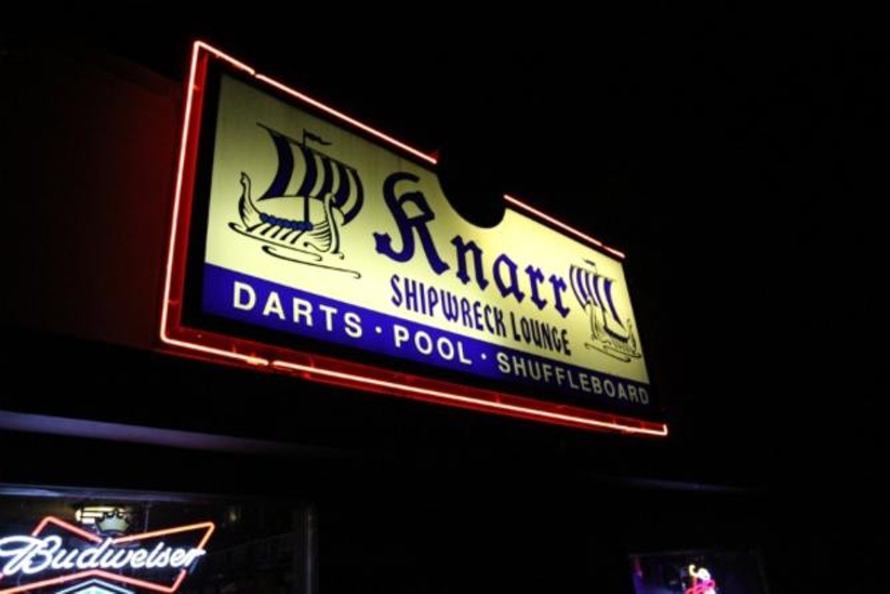 Many dive bars encourage sport. 
Knarr Shipwreck Lounge in Seattle, Washington.