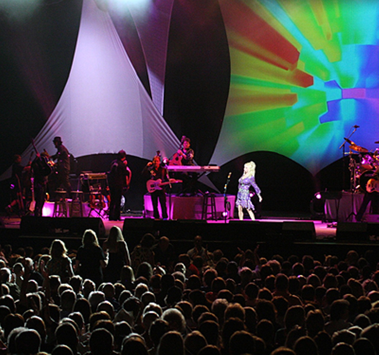 Dolly reaches to the converted during her performance on August 14, 2008 at the Fabulous Fox Theatre in St. Louis. 
Read the concert review and set list.