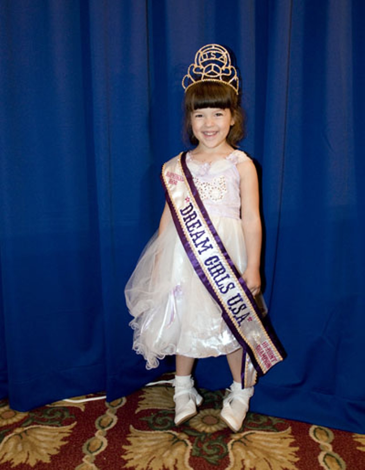 Samantha Hueschen from Wisconsin was this year's Baby/Tiny Miss High Point Champion.