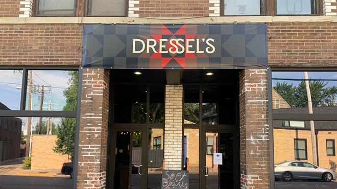 A sign outside Dressel’s entrance on Euclid Avenue invites the pub's Central West End neighbors in for its soft opening.