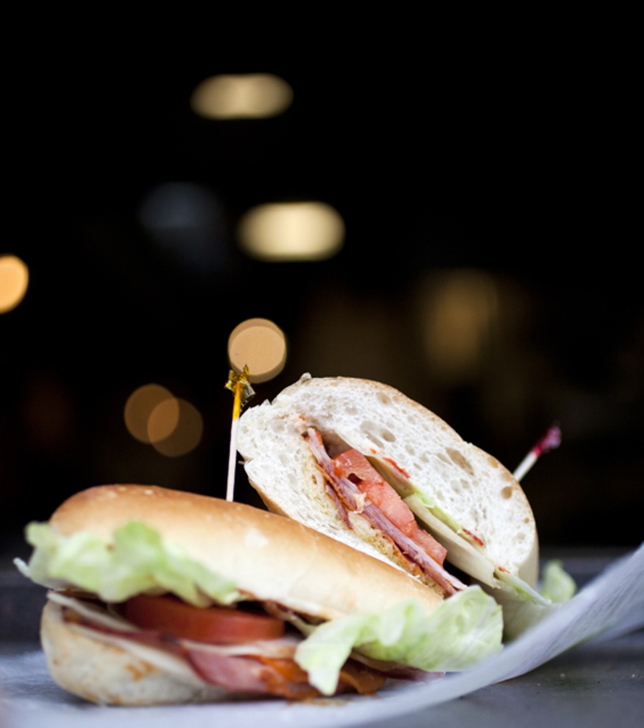 The Hill Sub is Volpi salami, capicola ham, pepperoni, prosciutto and ham, provolone, red cherry peppers, lettuce, tomatoes, and a house made vinaigrette.