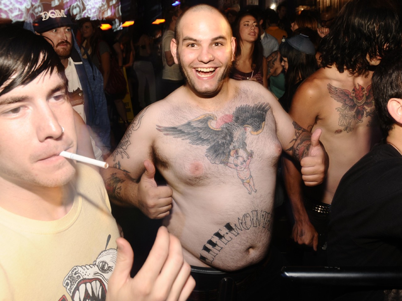 When you have tattoos, you have to show them off. Shot at London Calling at the Halo Bar on June 13. More photos.