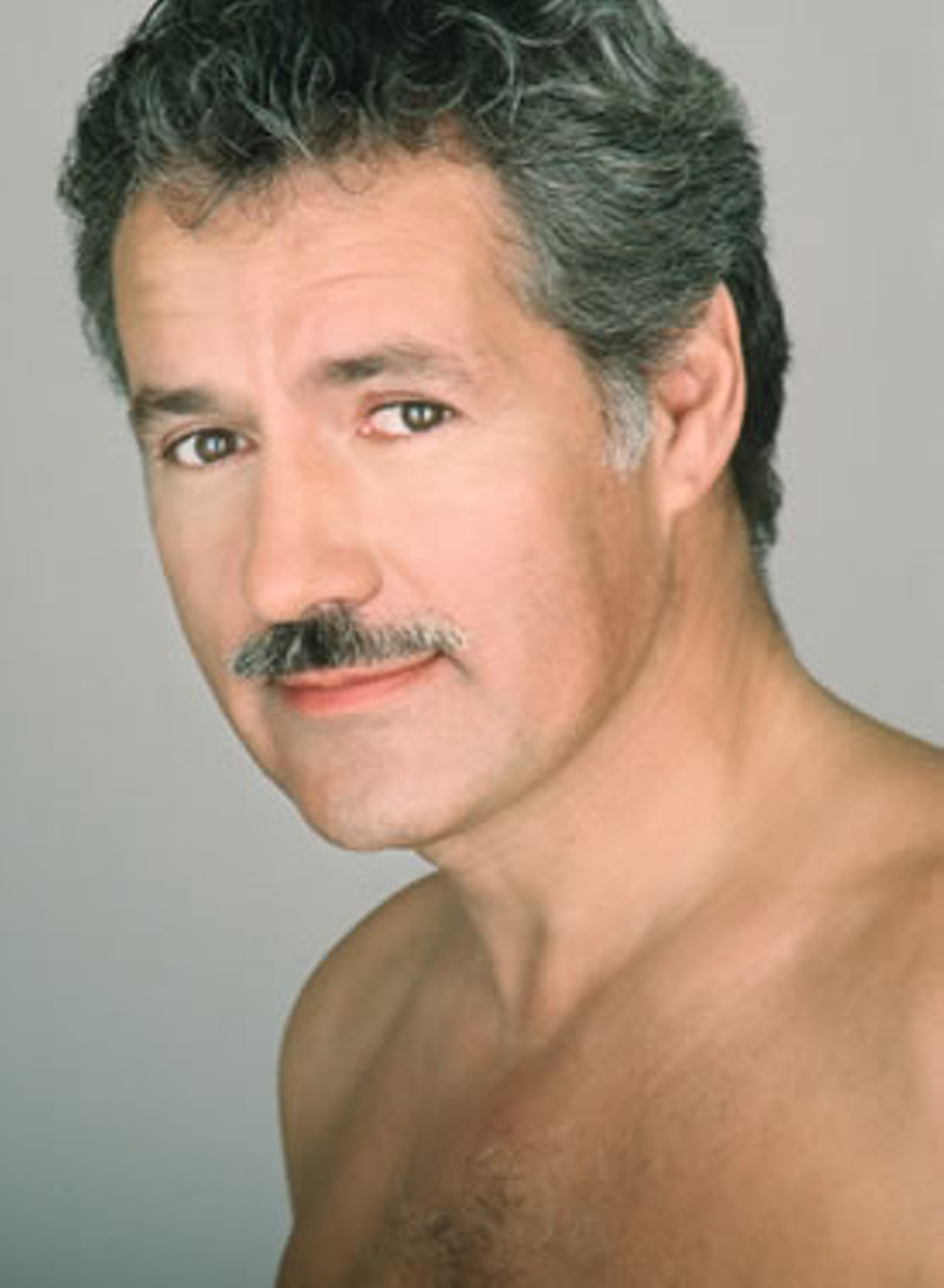 Alex Trebek, the Emmy-award winning host of Jeopardy. Don't know why he's shirtless here.