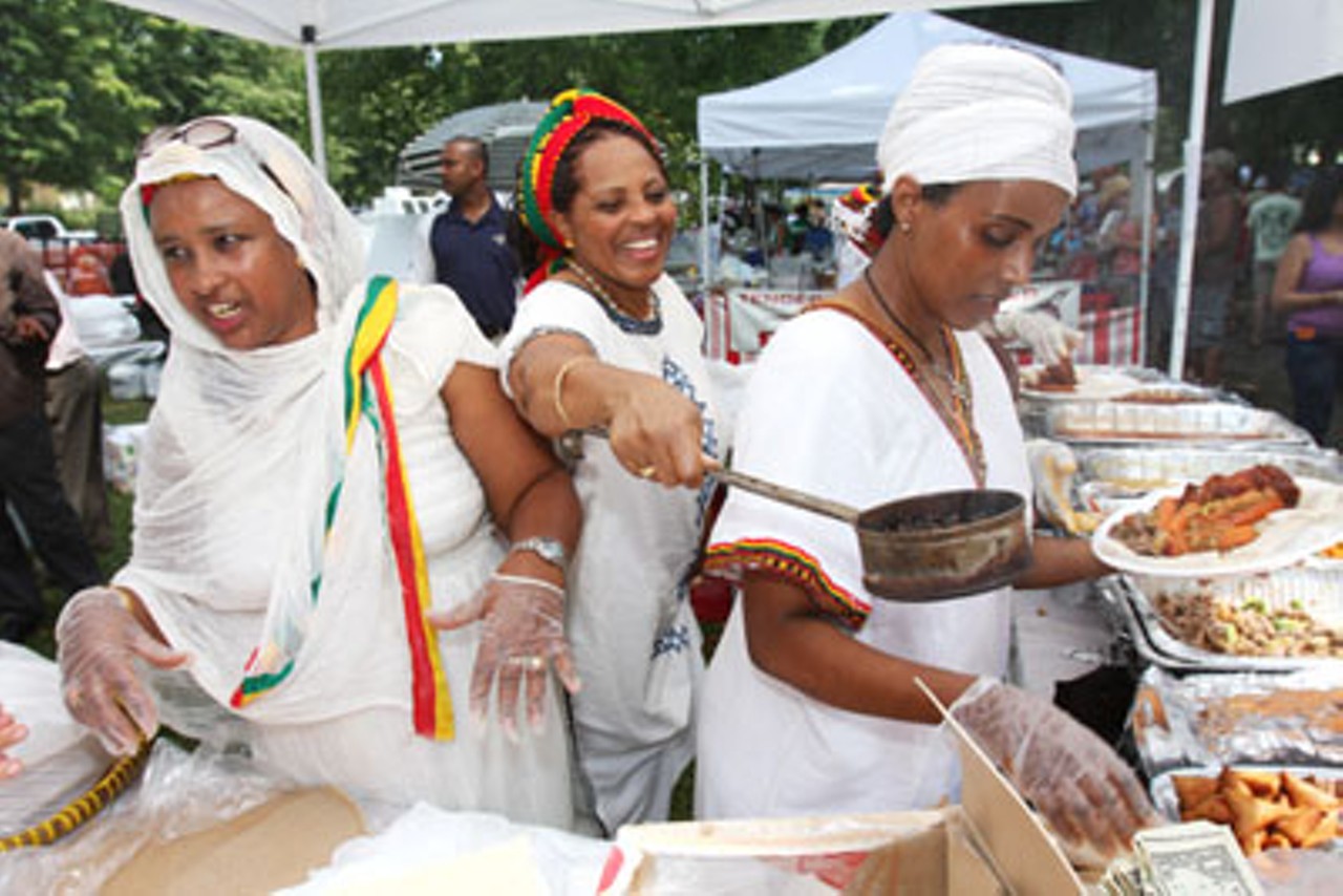 There were 34 different food booths, each representing a country. Pictured is the Ethiopian booth showing off their pot full of freshly roasted coffee beans.