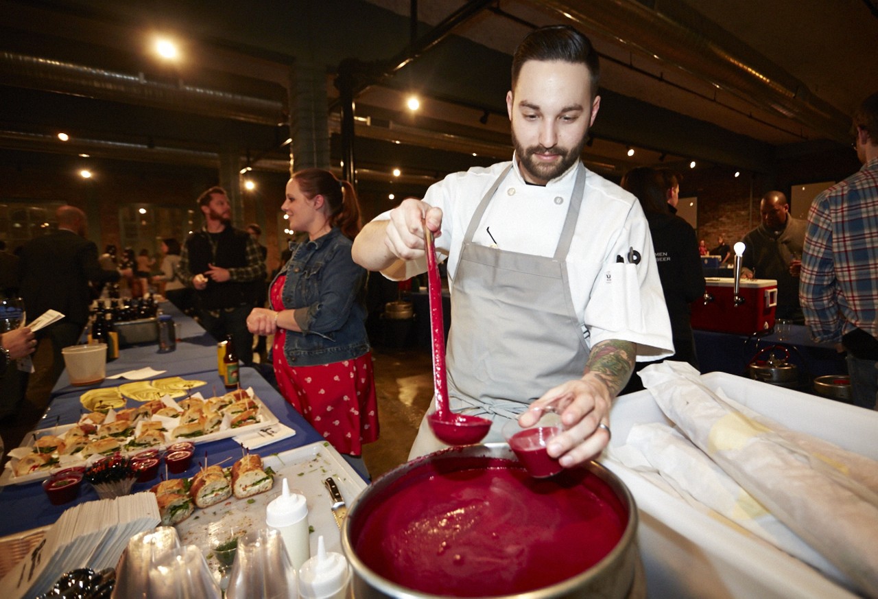 Chris Dimercurio, Chef at the HandleBar, serves up roasted beet soup at NEO on February 28th, 2015 for the FestivAle Craft Beer Tasting Event.