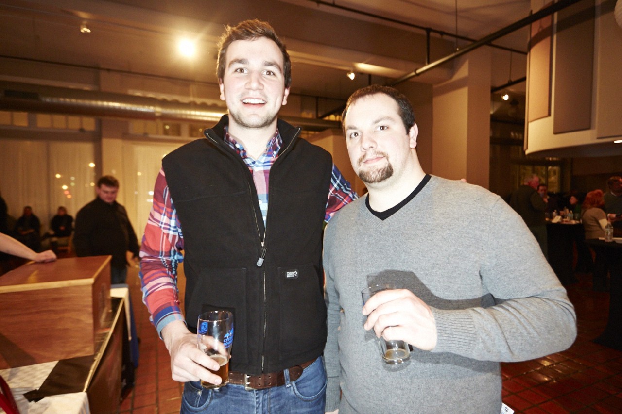 Ben and Brian Albers enjoy one of the many beers of the night. They said their favorite breweries are either Ferguson Brewing Company or O'Fallon Brewery.