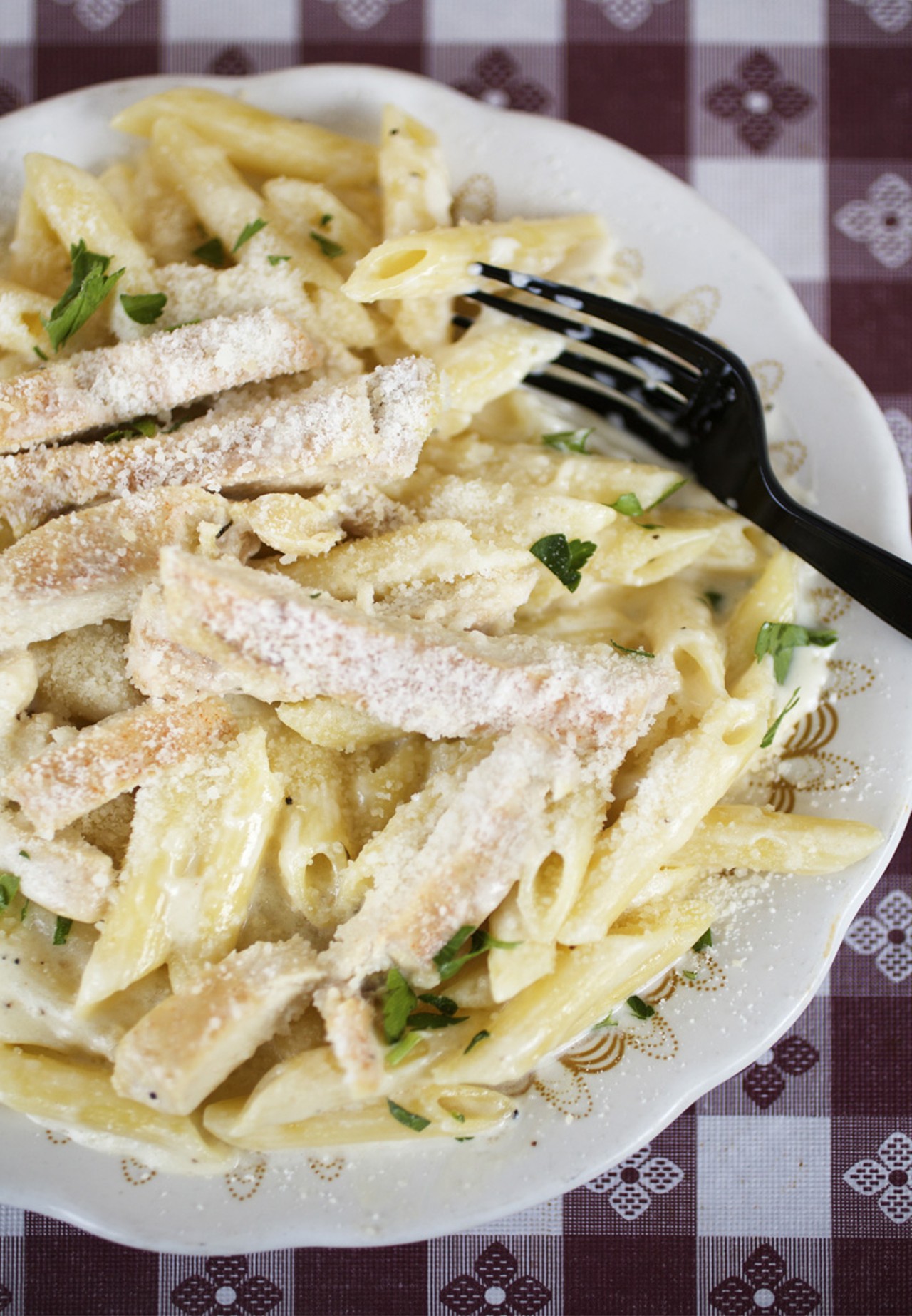 The Penne Alfredo is available plain or with Grilled chicken, as seen here.