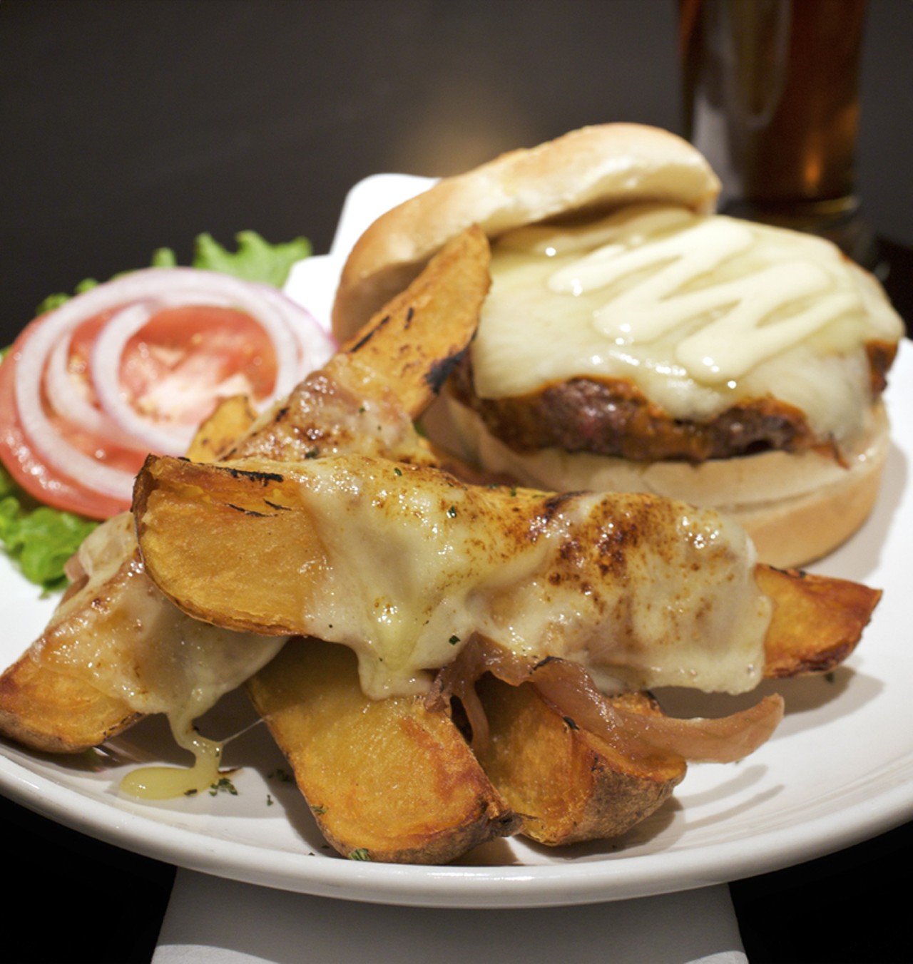 The buffalo-style burger is grilled and basted with a house sauce, Monterey Jack cheese and a house mayonnaise. And is shown here with French Onion steak fries, which Jeff tells us has not been a regular offering, but after this photo shoot, will probably become one.