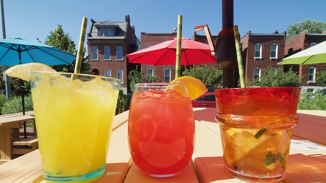 Station No. 3's Diego’s Margarita, Frida’s and Pimm’s Cup set against the restaurant's patio.