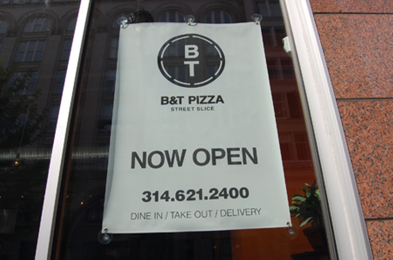 The pizza parlor has permits from the City of St. Louis to install more permanent signs.