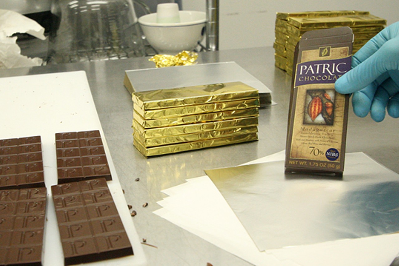 Finally, the wrapped bars are placed into their packing and the creation of a Patric Chocolate bar is complete.
