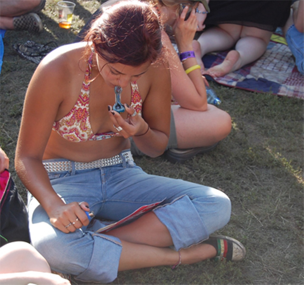 A rare fashion accessory, pot smoking is none the less a staple of most music festivals.