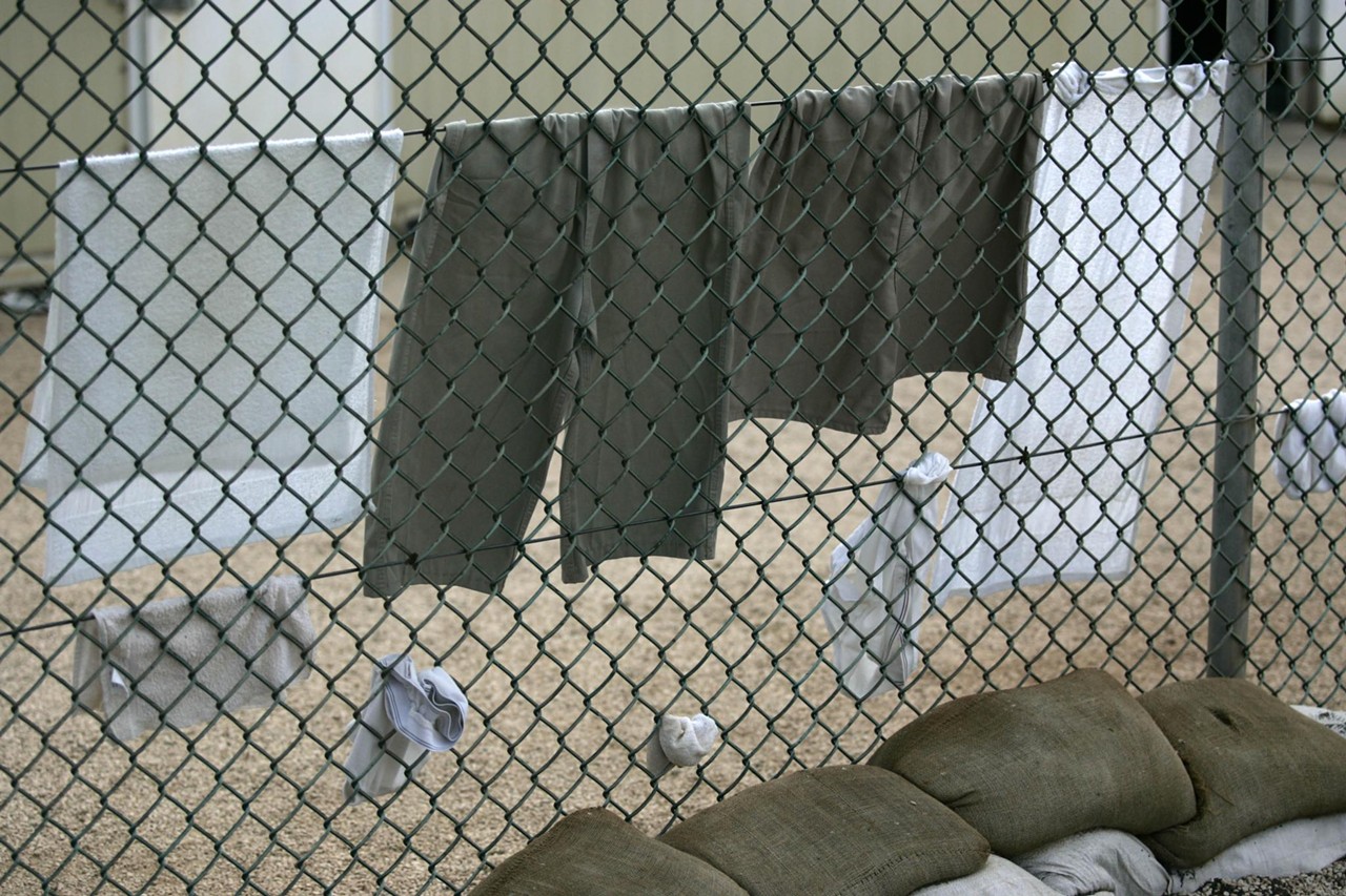 Detainees in Camp 4 do their own laundry and hang it to dry from chainlink fences.