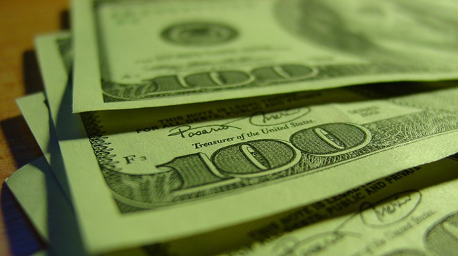 Close up shot of $100 bills.