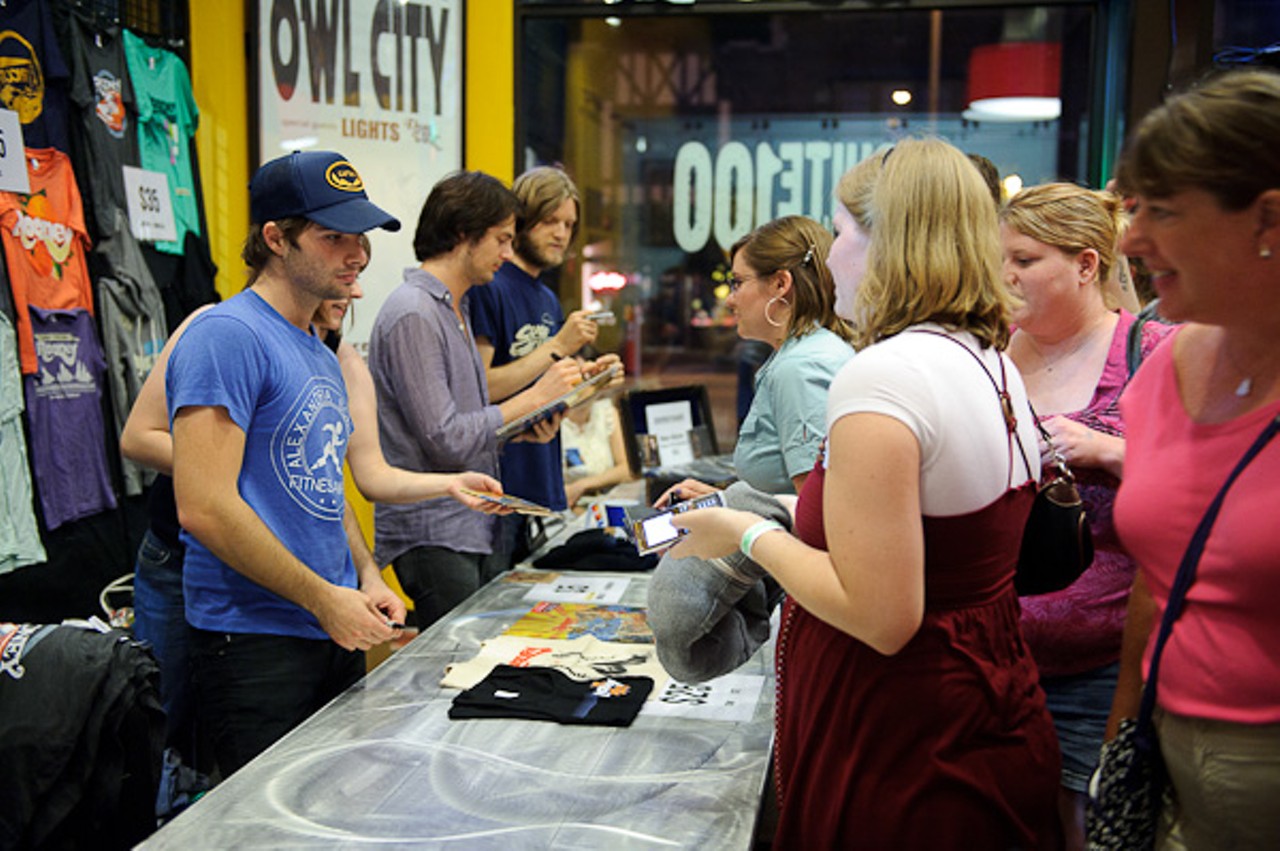 Fans line up for official band merchandise at the Pageant in St. Louis.