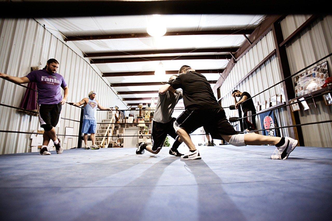 Wrestlers practicing their craft.