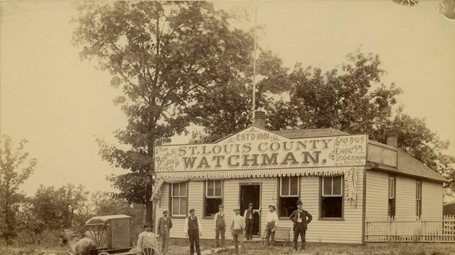 St. Louis County Watchman Office with men posing in front and horse and buggy.