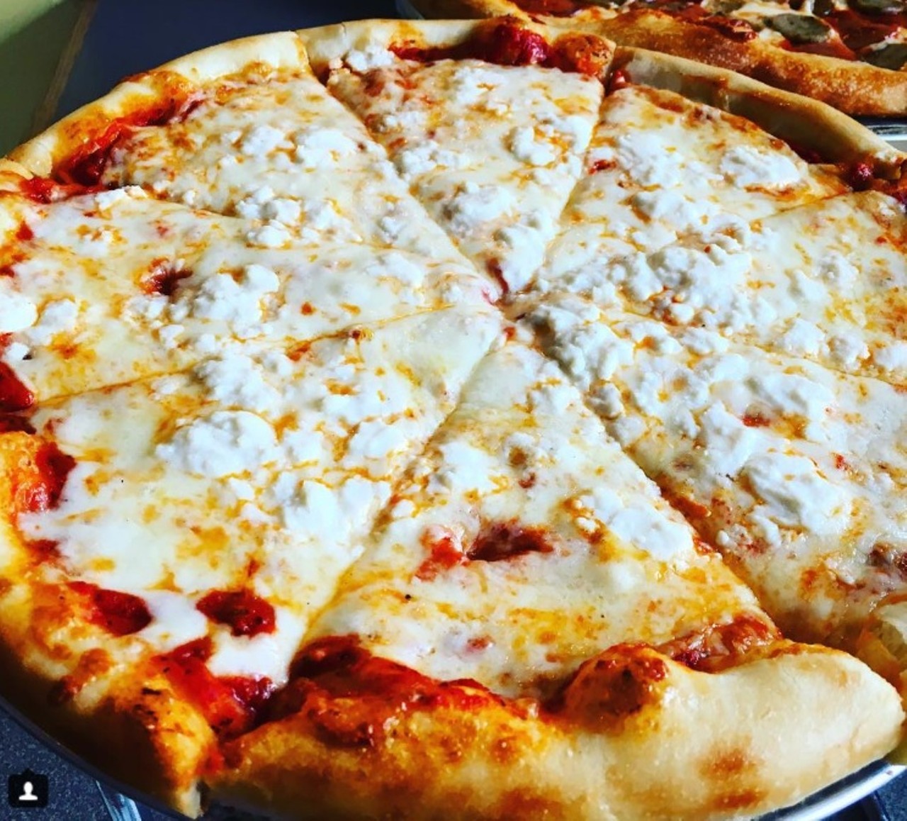Dewey's Pizza
Locations in University City, Webster Groves, Kirkwood, Edwardsville, St. Charles and Ellisville
This small Midwestern chain has pizza you don't want to miss. You can choose one of Dewey's creative combos or make your own and decide between white and red sauce. Dewey's offers gluten-free crust, too. Photo courtesy of Instagram / thefoodiefriend.