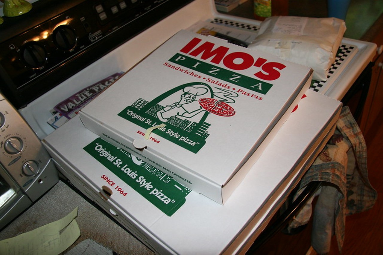 Pizza should be as flat and thin as the corrugated cardboard the box it came in is made of.