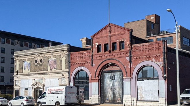 Preservationists hope to save the buildings at 3223 Olive Street, left, and 3221 Olive.