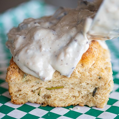 Rosemary biscuit topped with mushroom gravy.