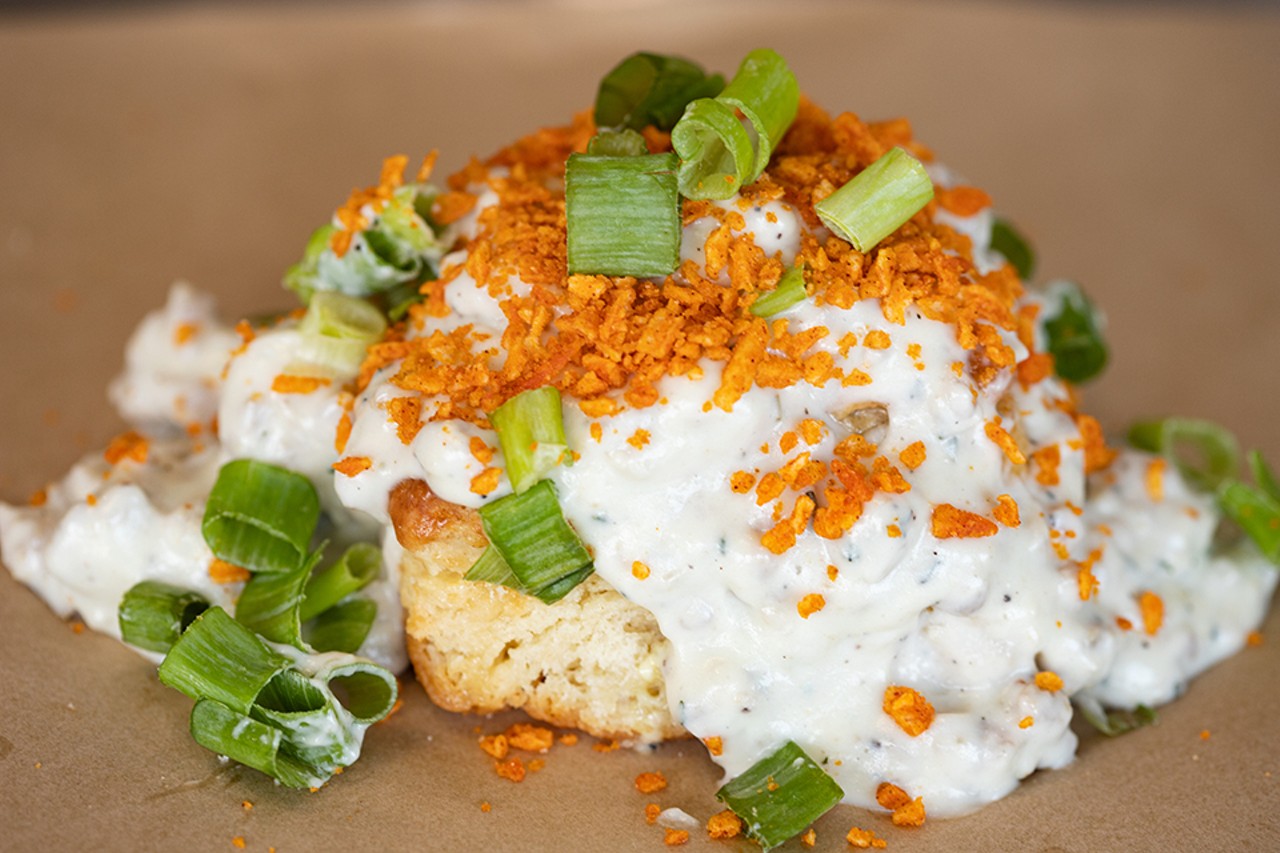 Honey Bee's "Bee Sting" combo features sausage gravy, Red Hot Riplets and green onions.