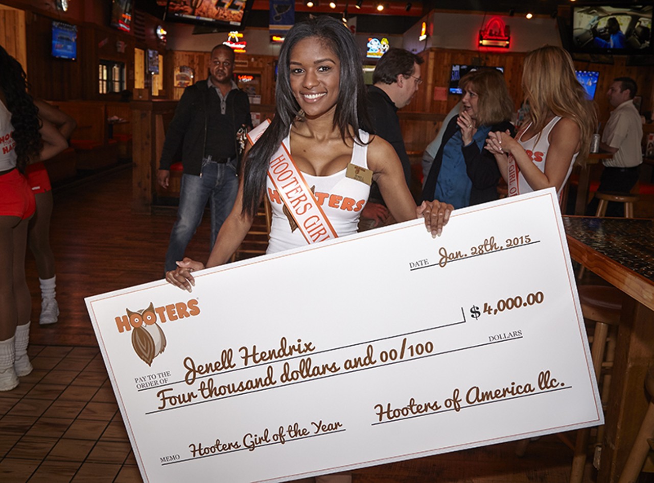 Hendrix and her cash prize.
