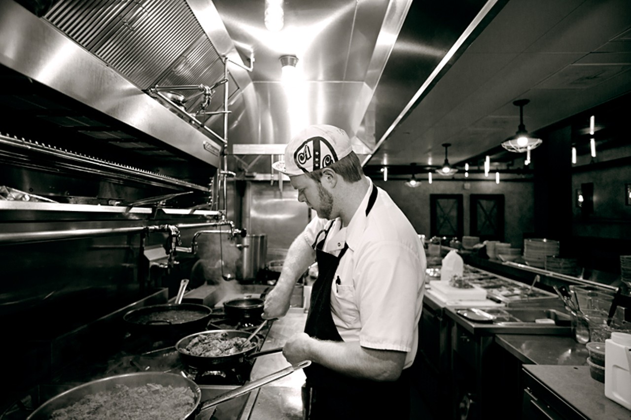 Lunch chef Chris Mazzola in the open kitchen at Basso.